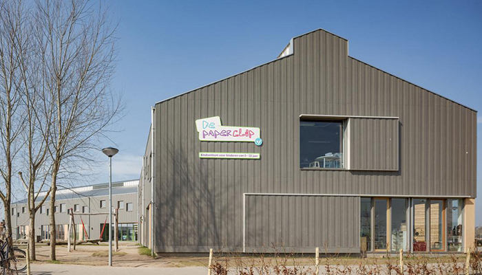 Un magnifique bâtiment scolaire alliant typologie des hangars en bois et facilité d’entretien